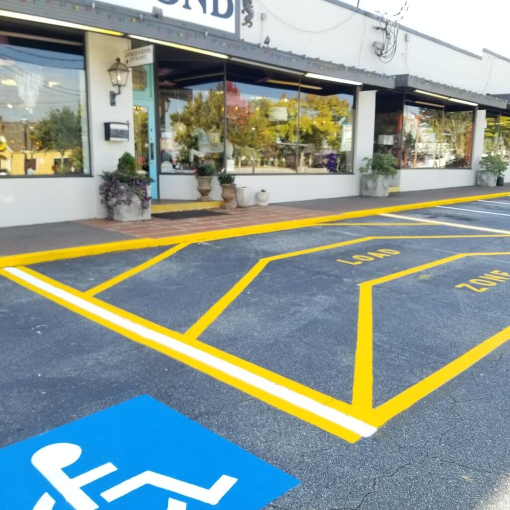 WHITE STRIPES STRIPING COMPANY ON RANK IN THE CITY | ASPHALT STRIPING, PARKING LOT STRIPING, SEAL COATING SERVICES